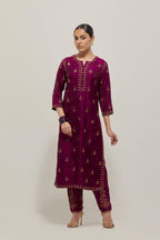 Wine double toned silk straight kurta with all-over hand embroidered zardozi and sequins work, highlighted with beads.