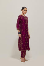 Wine double toned silk straight kurta with all-over hand embroidered zardozi and sequins work, highlighted with beads.
