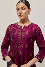 Wine double toned silk straight kurta with all-over hand embroidered zardozi and sequins work, highlighted with beads.