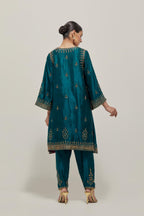 Teal Green double toned silk easy fit short kurta set with hand embroidered zardozi and sequins, highlighted with beads.