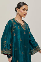 Teal Green double toned silk easy fit short kurta set with hand embroidered zardozi and sequins, highlighted with beads.