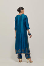 Teal double toned silk straight Kurta set with hand embroidered zardozi and sequins, highlighted with beads.