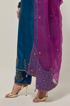 Purple silk organza dupatta with all-over delicate sequins and bead small booti, finished with applique bandhani-inspired motifs at all four corners.