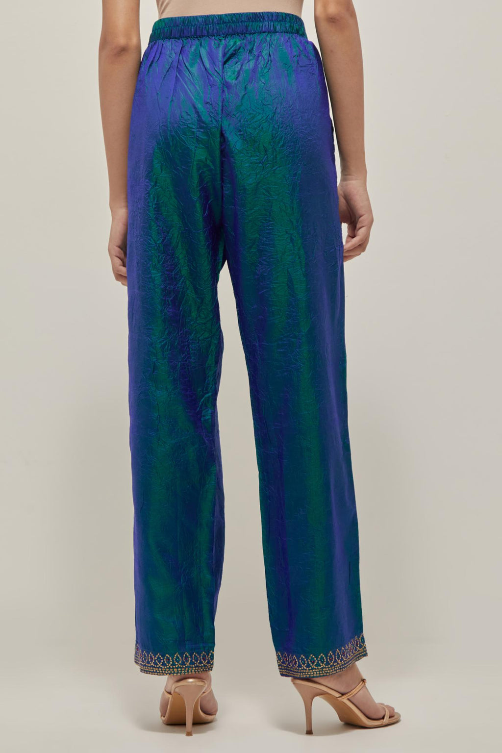 Teal Blue silk pants with a narrow bandhani-inspired border at the hem, detailed with delicate bead and sequin work.