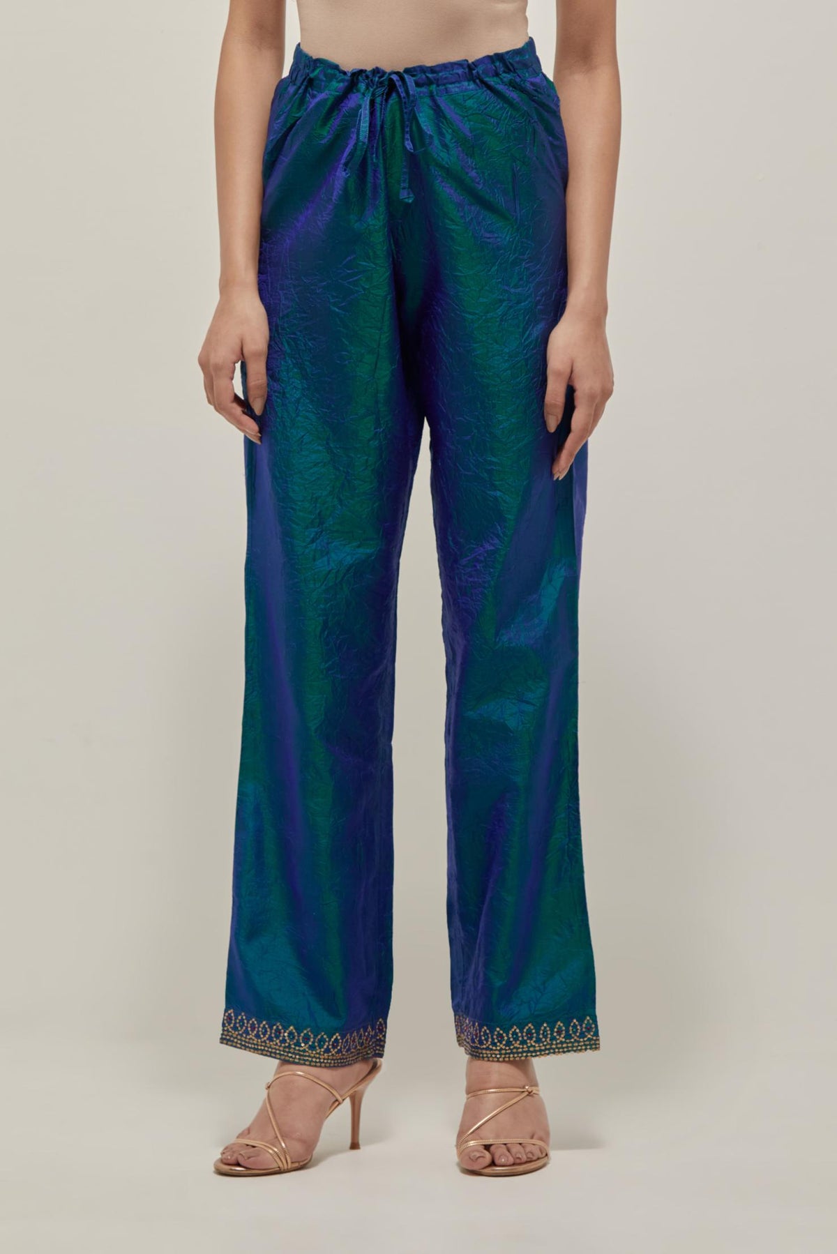 Teal Blue silk pants with a narrow bandhani-inspired border at the hem, detailed with delicate bead and sequin work.