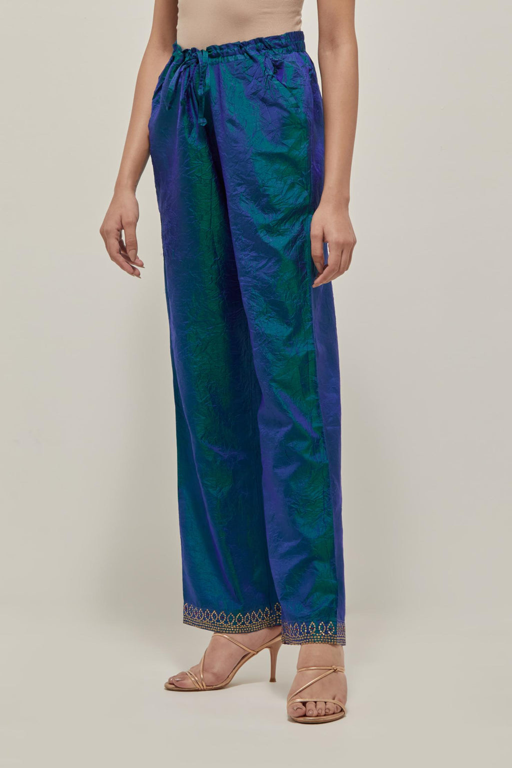 Teal Blue silk pants with a narrow bandhani-inspired border at the hem, detailed with delicate bead and sequin work.