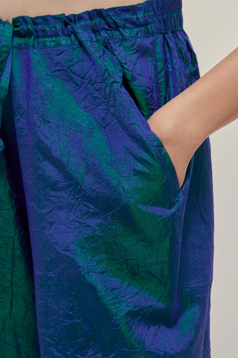 Teal Blue silk pants with a narrow bandhani-inspired border at the hem, detailed with delicate bead and sequin work.