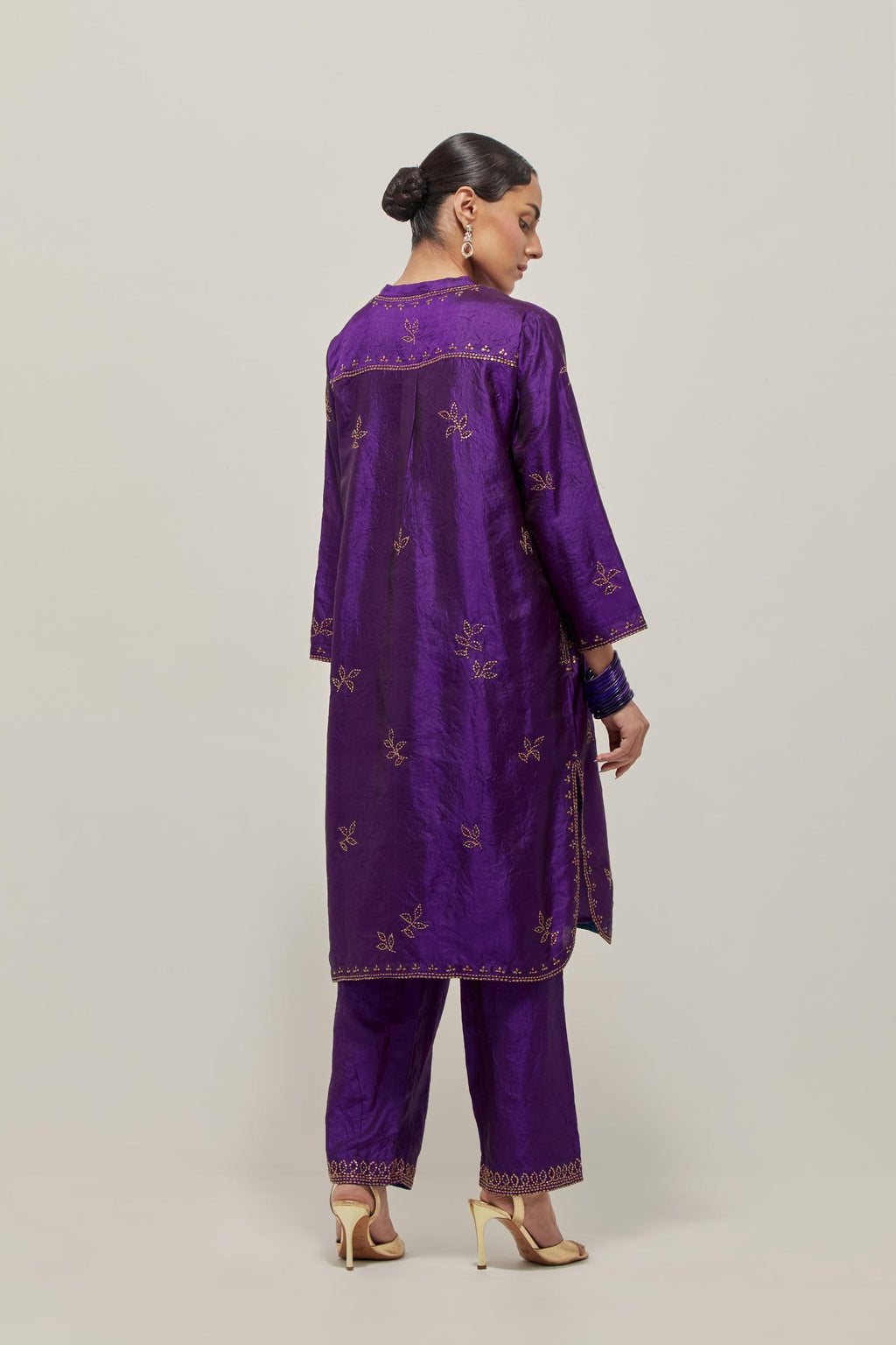 Purple Silk short kurta set with hand embroidered sequins on bandhani inspired floral motifs all-over the kurta, highlighted with contrast-colored beads.