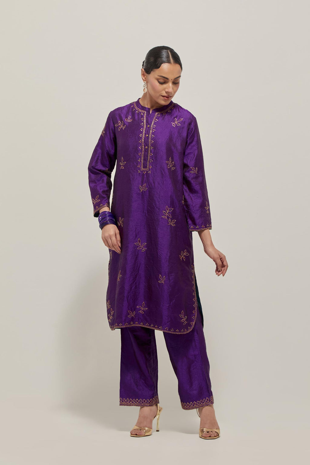 Purple Silk short kurta set with hand embroidered sequins on bandhani inspired floral motifs all-over the kurta, highlighted with contrast-colored beads.