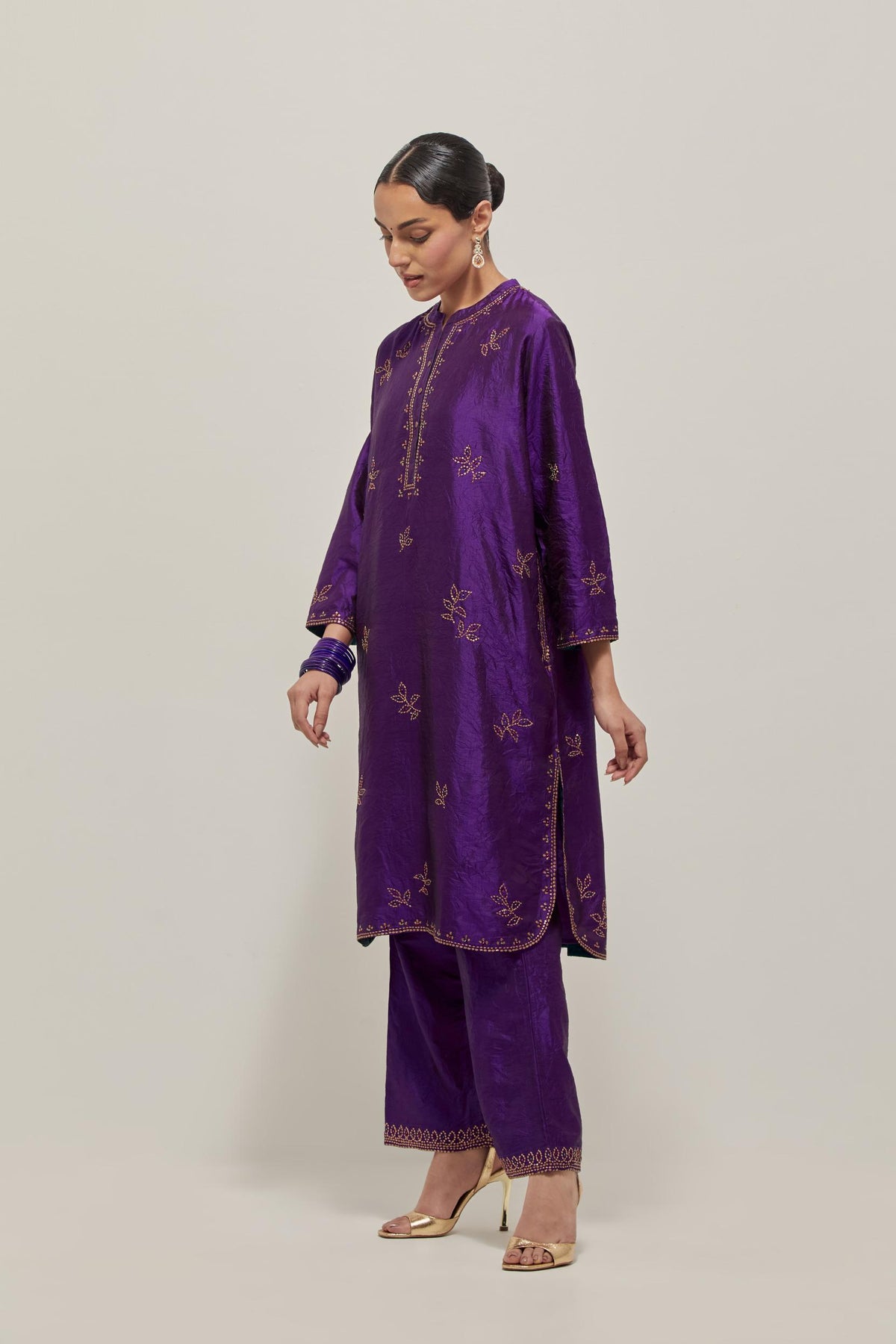 Purple Silk short kurta set with hand embroidered sequins on bandhani inspired floral motifs all-over the kurta, highlighted with contrast-colored beads.