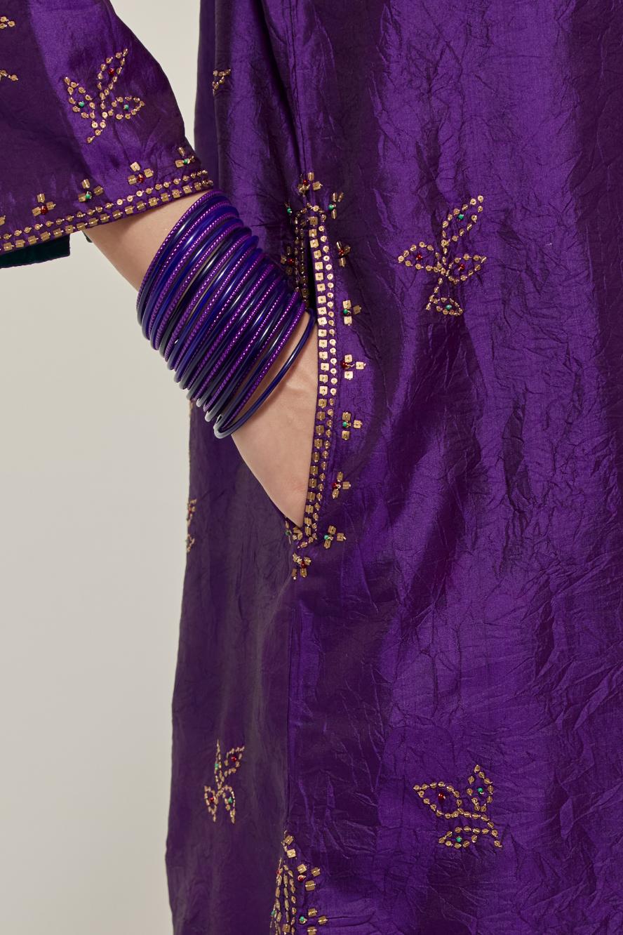 Purple Silk short kurta set with hand embroidered sequins on bandhani inspired floral motifs all-over the kurta, highlighted with contrast-colored beads.
