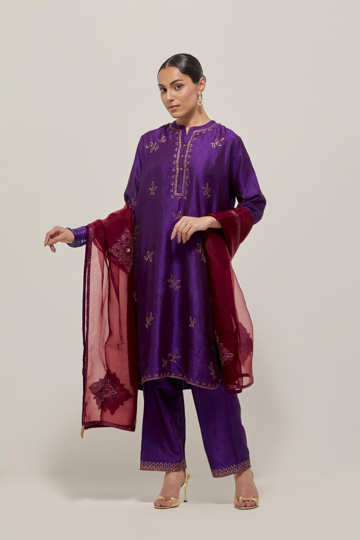 Purple Silk short kurta set with hand embroidered sequins on bandhani inspired floral motifs all-over the kurta, highlighted with contrast-colored beads.