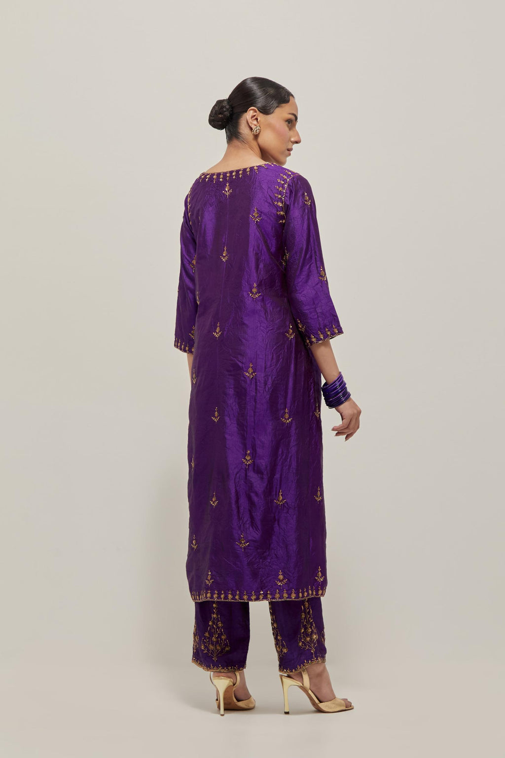 Purple double toned silk Kurta set dress with all-over hand embroidered zardozi and sequins, highlighted with beads.