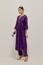 Purple double toned silk Kurta set dress with all-over hand embroidered zardozi and sequins, highlighted with beads.