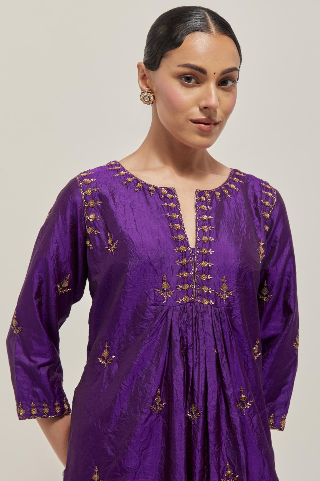 Purple double toned silk Kurta set dress with all-over hand embroidered zardozi and sequins, highlighted with beads.