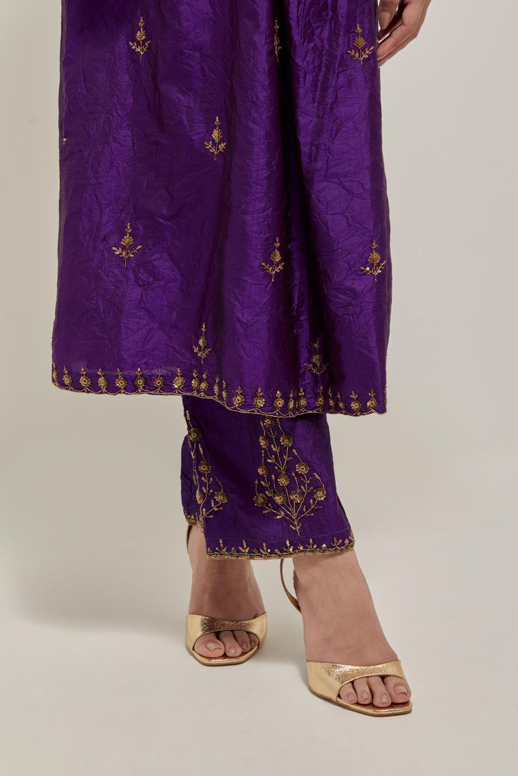 Purple double toned silk Kurta set dress with all-over hand embroidered zardozi and sequins, highlighted with beads.