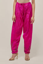 Fuchsia Silk salwar, highlighted with hand embroidered bead, sequins and zardozi boota at hem, highlighted with contrast bead work.