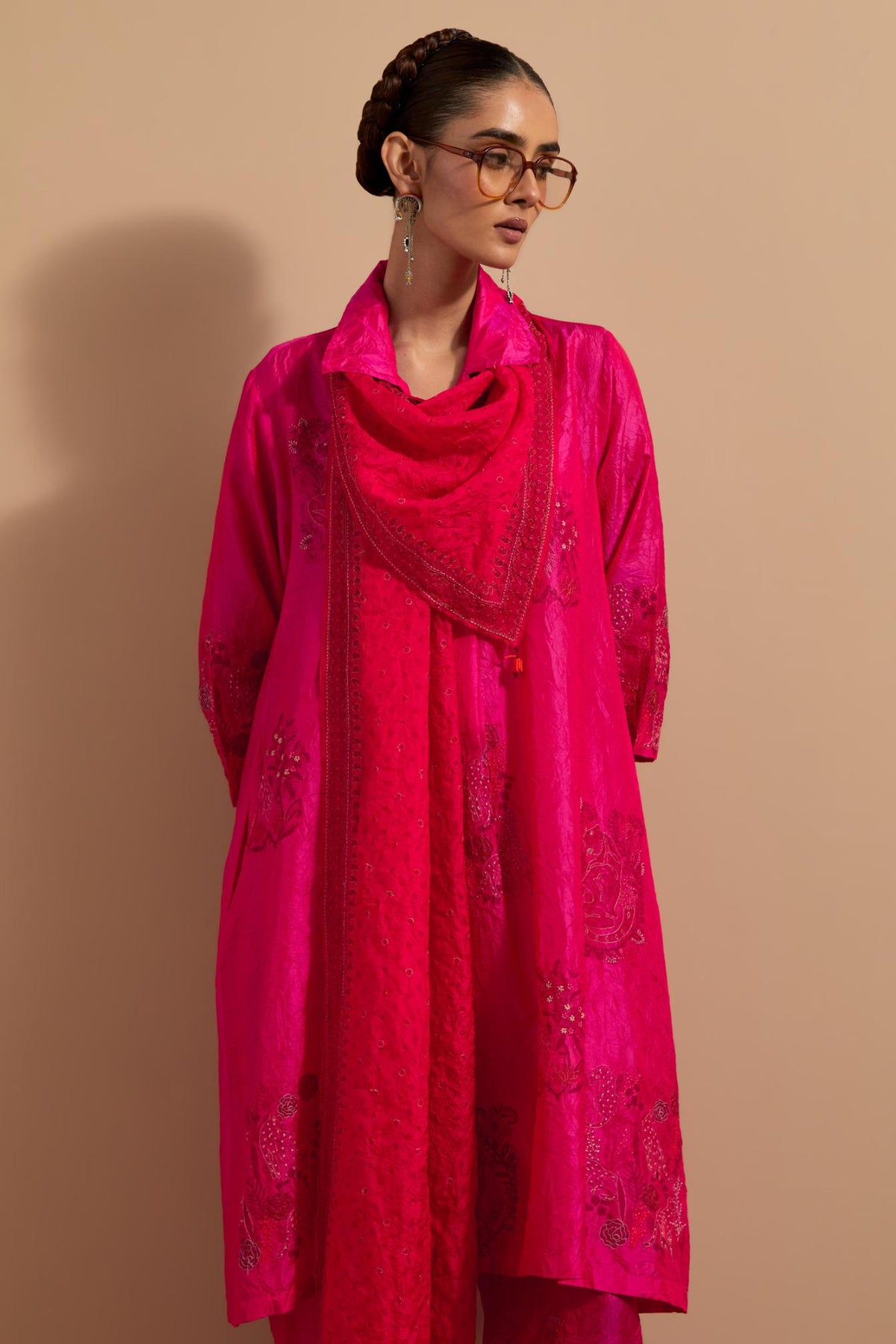 Red hand crushed block printed silk stole with quilted embroidery and beaded tassels.