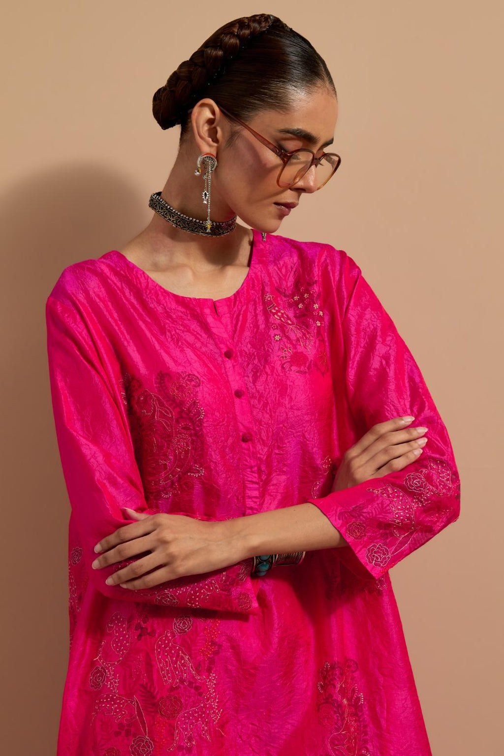 Fuchsia crushed silk short kurta set with hand block print, highlighted with multi colored thread embroidery.