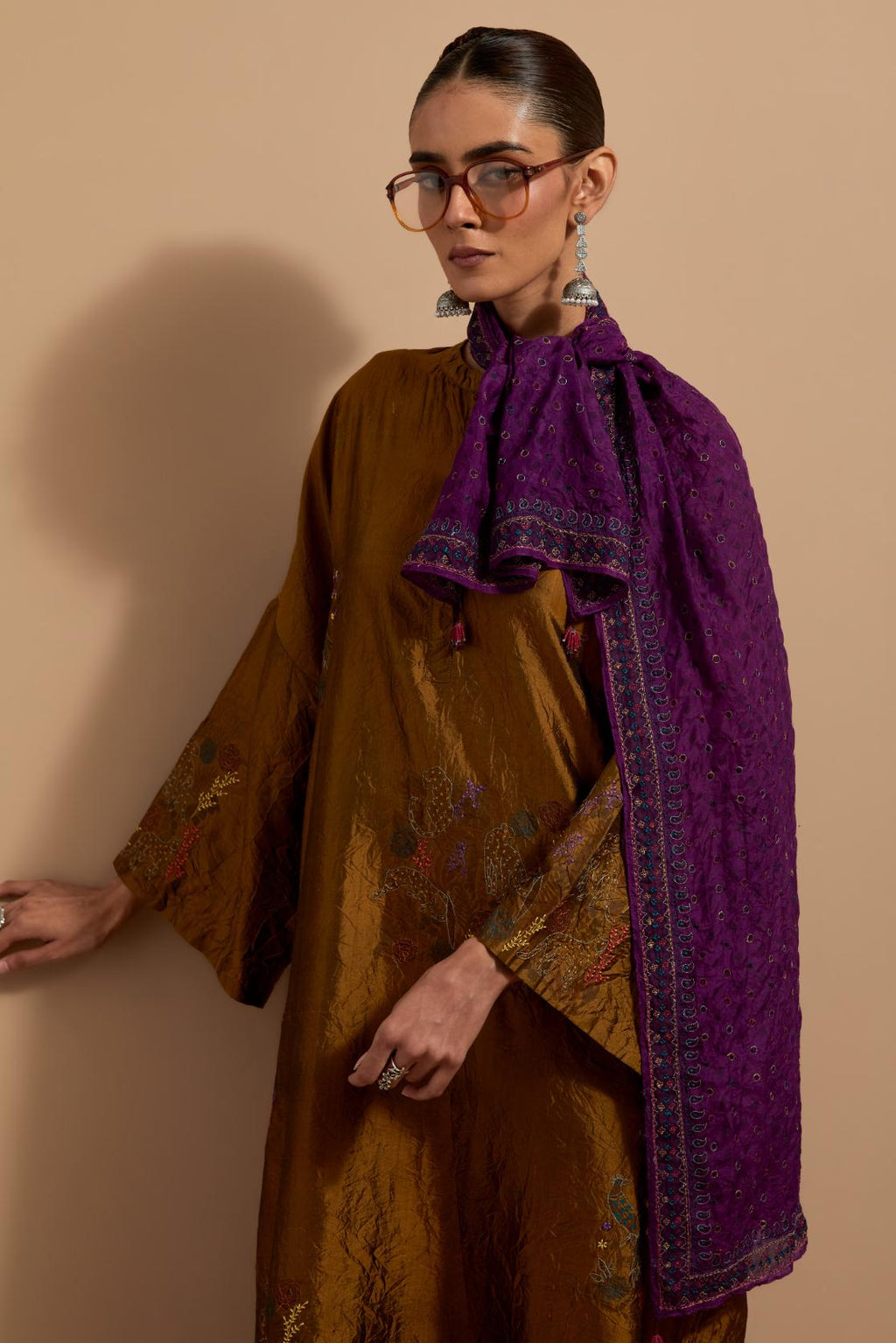 Olive hand crushed block printed silk stole with quilted embroidery and beaded tassels.