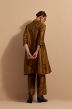 Olive crushed silk A-line short kurta set with hand block print, highlighted with multi colored thread embroidery.