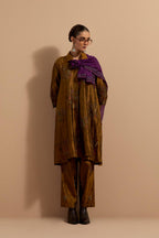 Olive crushed silk A-line short kurta set with hand block print, highlighted with multi colored thread embroidery.