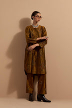 Olive crushed silk short kurta set with hand block print, highlighted with multi colored thread embroidery.