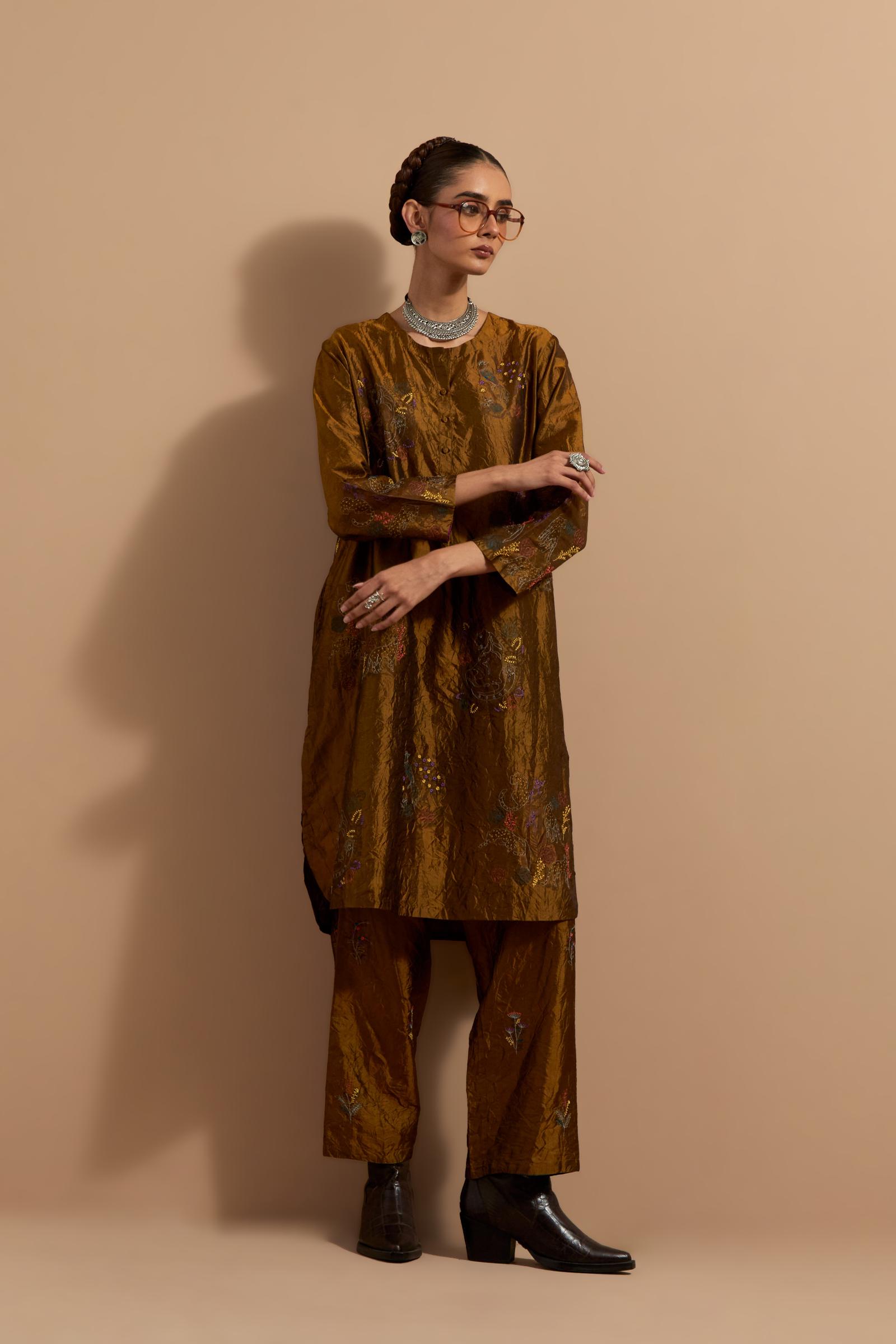 Olive crushed silk short kurta set with hand block print, highlighted with multi colored thread embroidery.