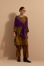 Olive crushed silk short kurta set with hand block print, highlighted with multi colored thread embroidery.