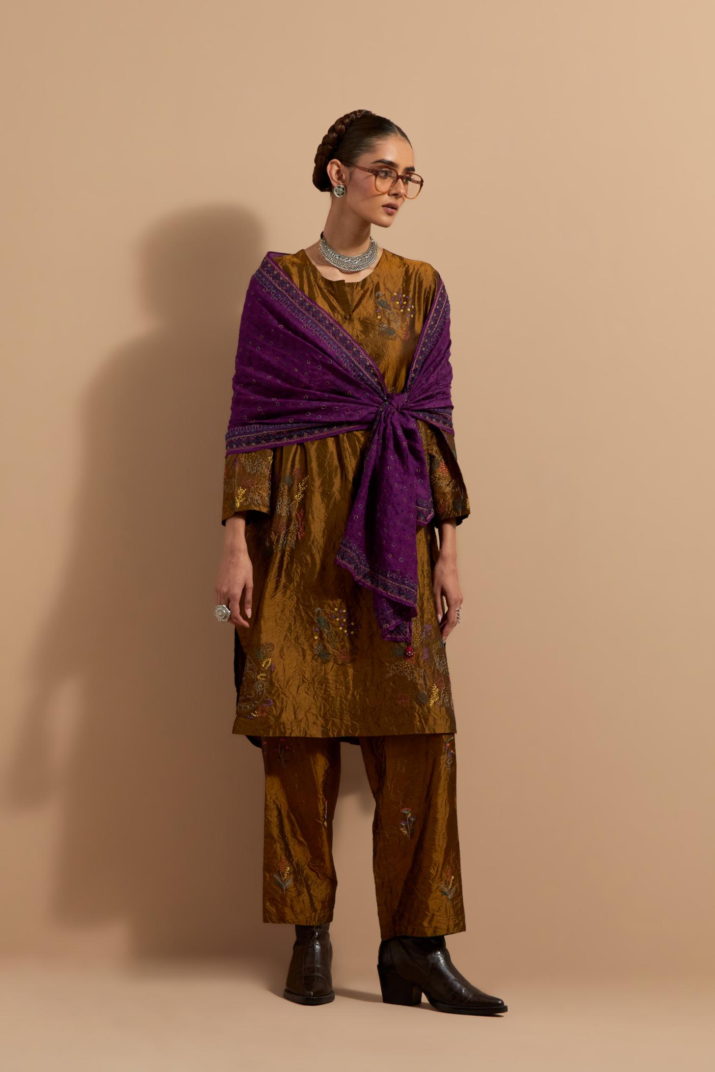 Olive crushed silk short kurta set with hand block print, highlighted with multi colored thread embroidery.