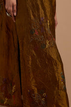 Olive crushed silk hand block printed kurta set with pin tucks at yoke, highlighted with multi colored thread embroidery.