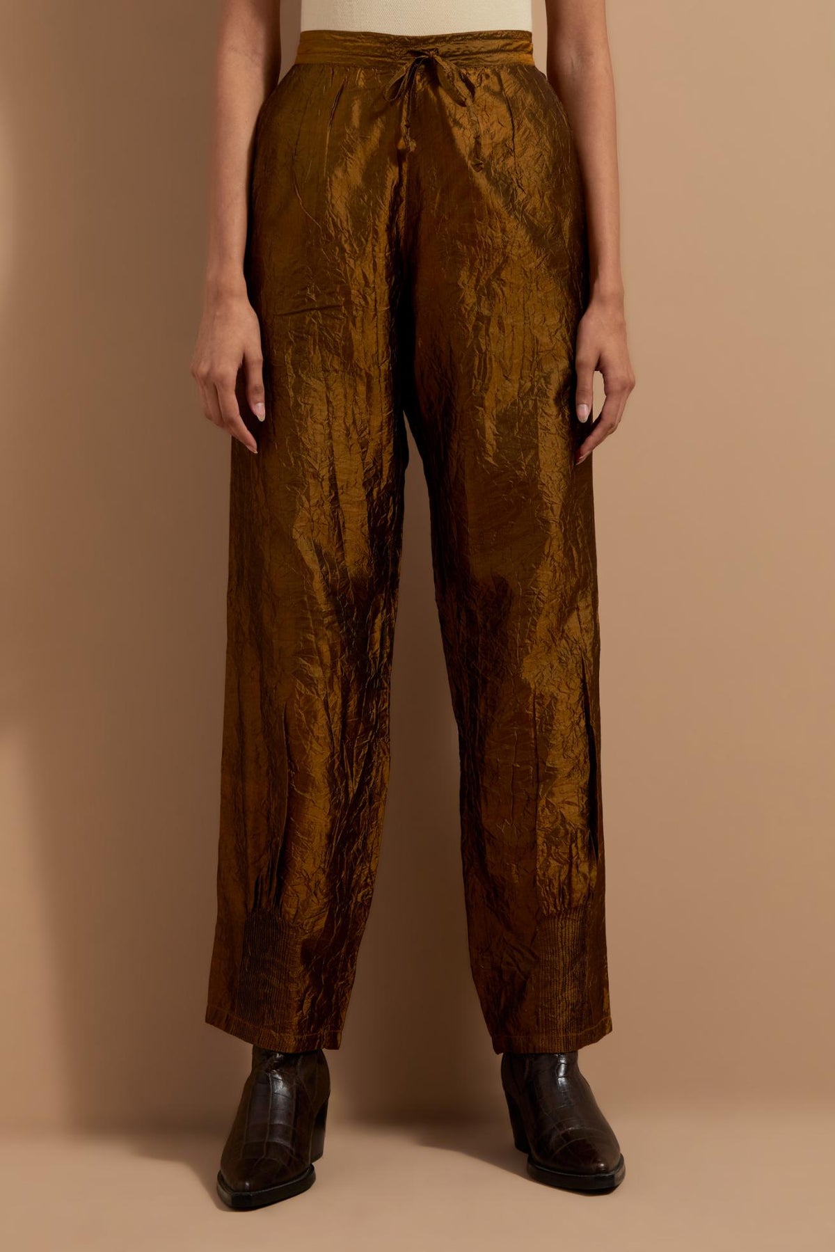 Olive crushed silk hand block printed pants with pin tucks detailing at hem.