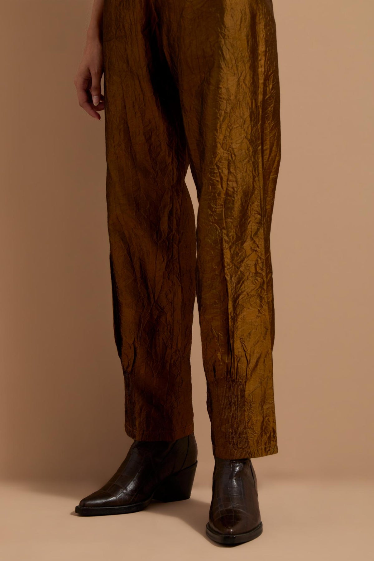 Olive crushed silk hand block printed pants with pin tucks detailing at hem.