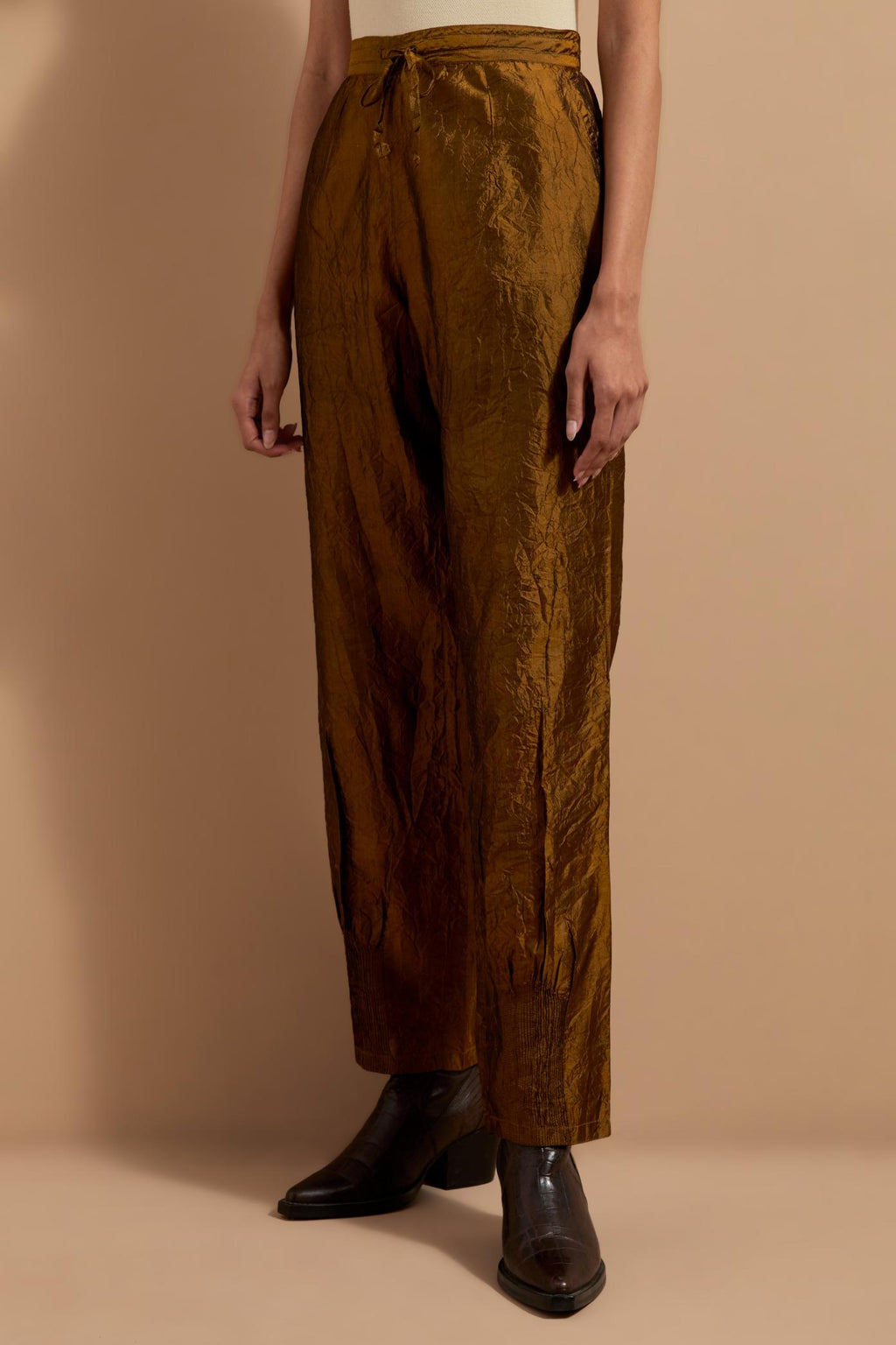 Olive crushed silk hand block printed pants with pin tucks detailing at hem.