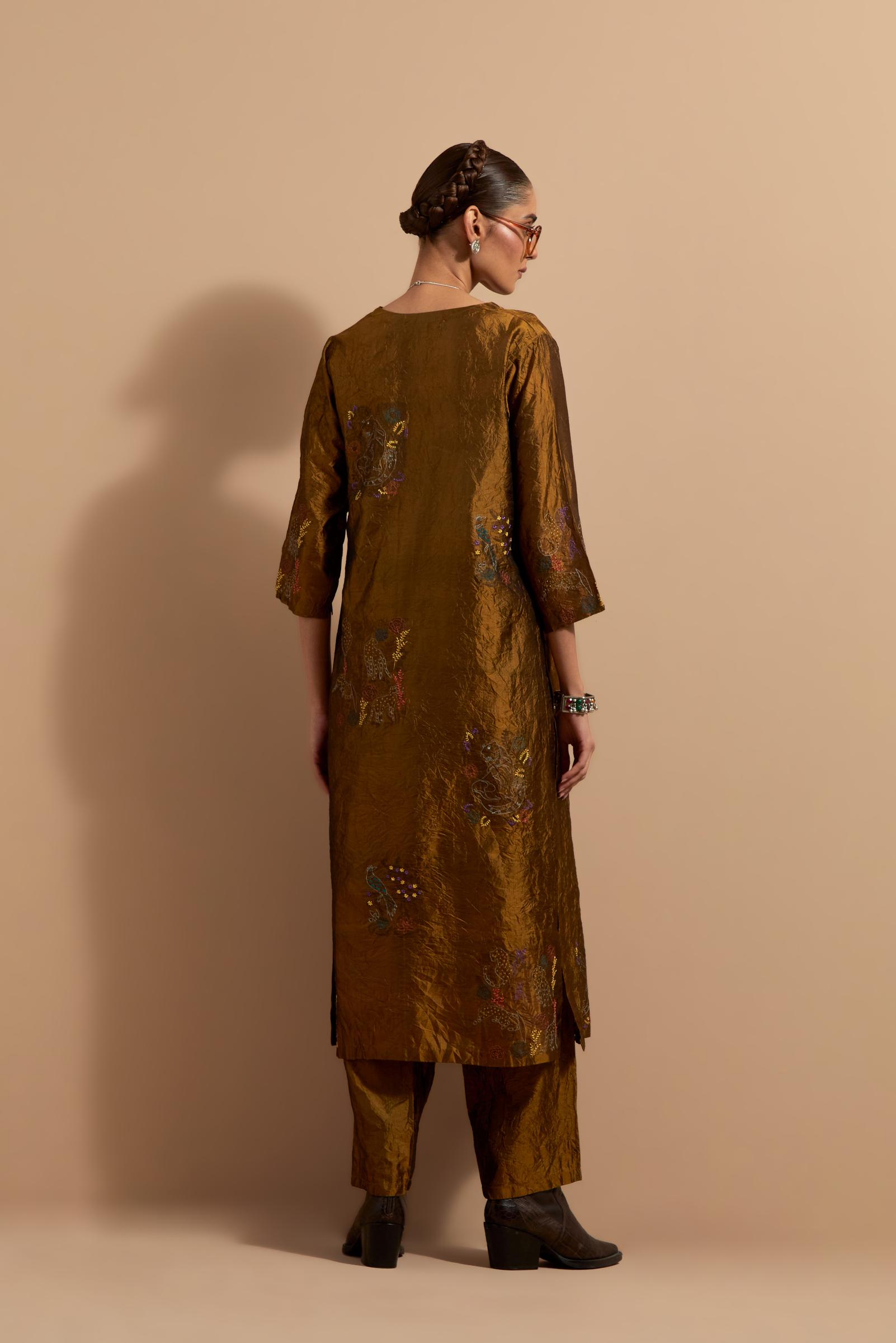 Olive crushed silk hand block printed straight kurta set, highlighted with multi colored thread embroidery.