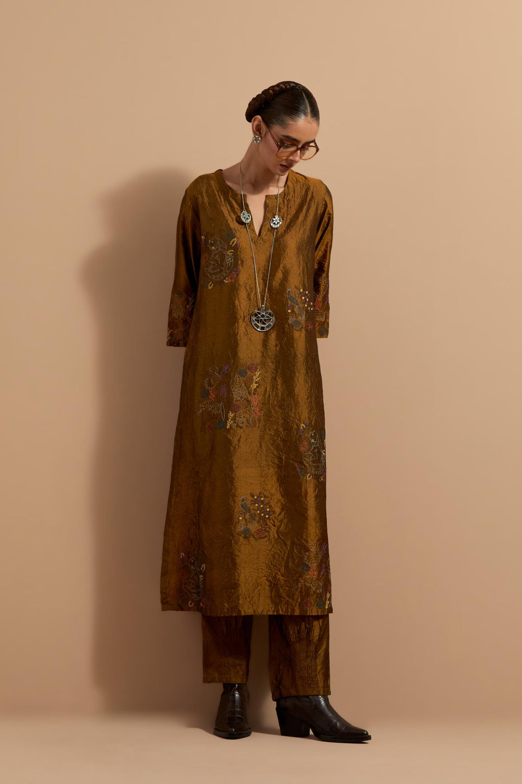 Olive crushed silk hand block printed straight kurta set, highlighted with multi colored thread embroidery.