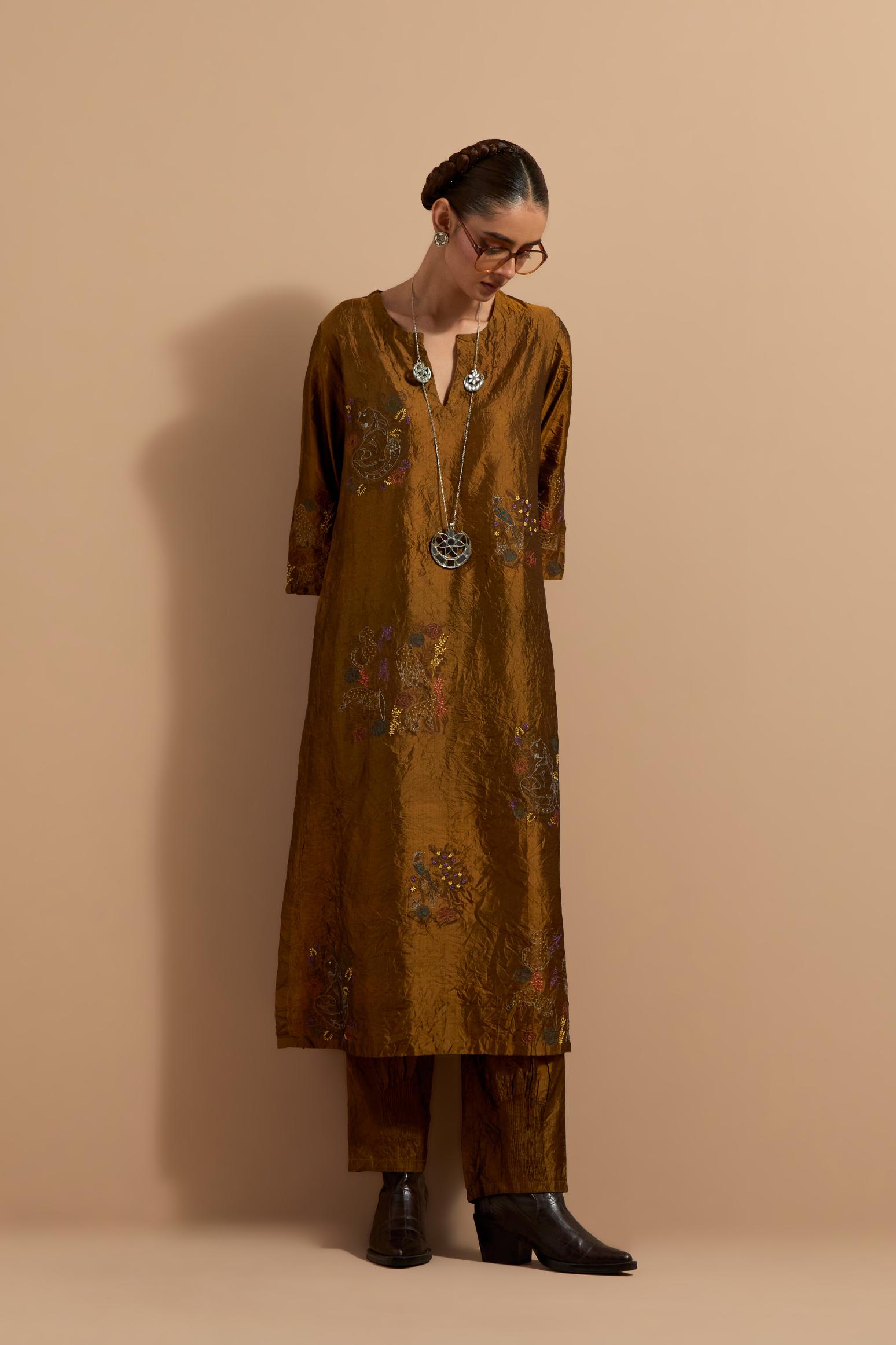 Olive crushed silk hand block printed straight kurta set, highlighted with multi colored thread embroidery.