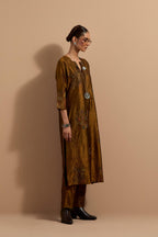 Olive crushed silk hand block printed straight kurta set, highlighted with multi colored thread embroidery.