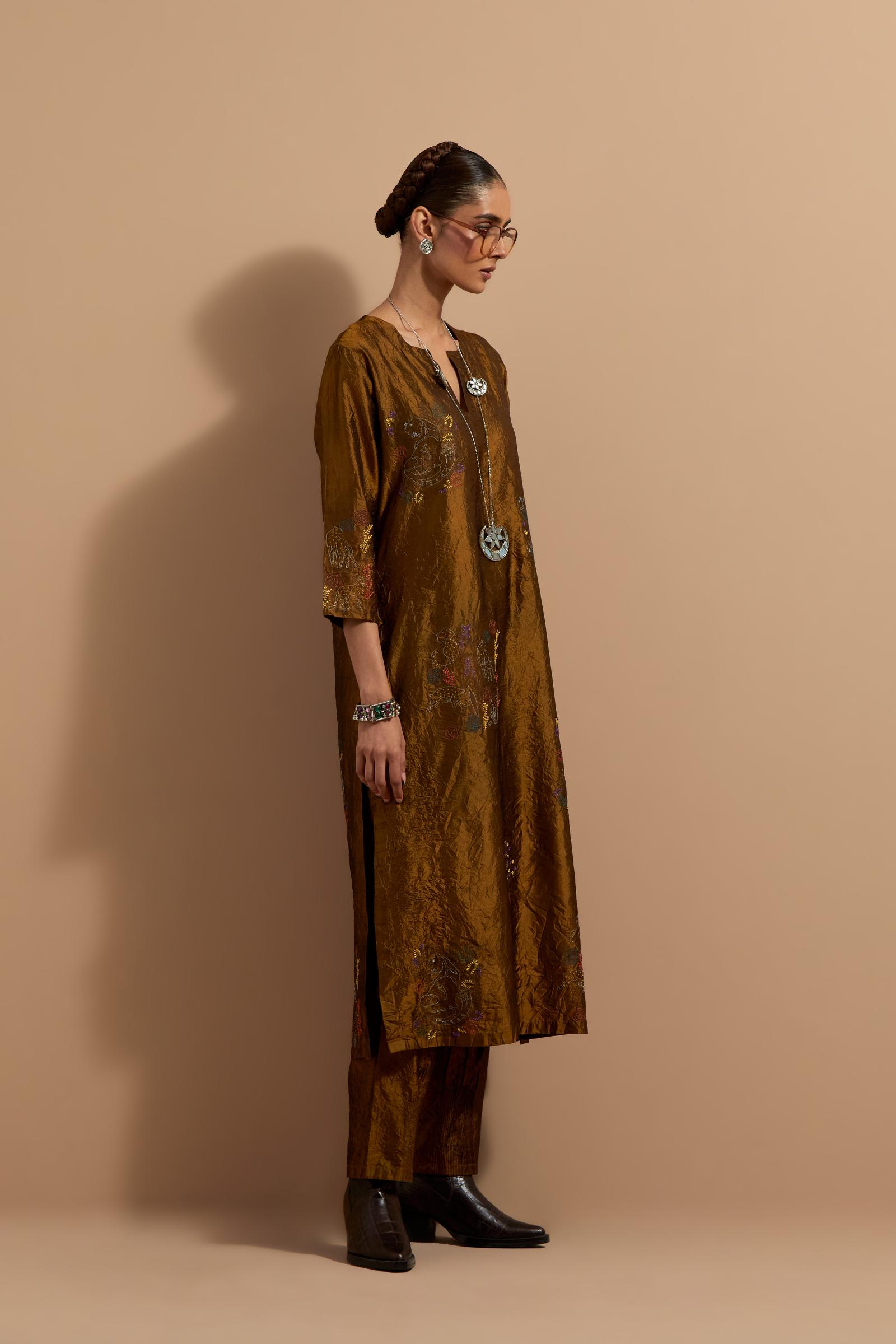 Olive crushed silk hand block printed straight kurta set, highlighted with multi colored thread embroidery.