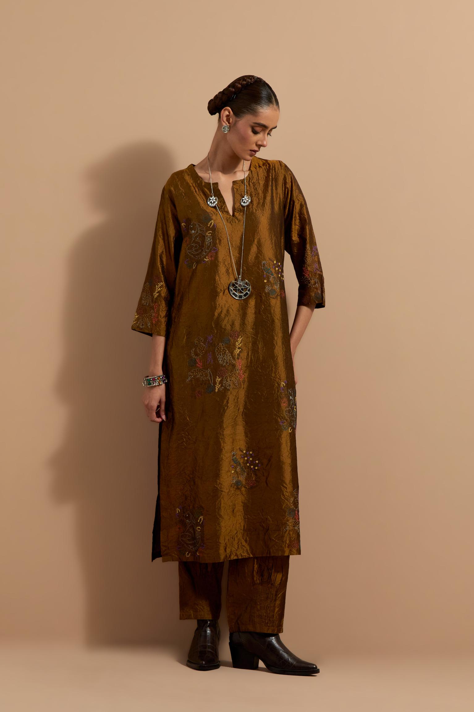 Olive crushed silk hand block printed straight kurta set, highlighted with multi colored thread embroidery.