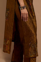 Olive crushed silk hand block printed straight kurta set, highlighted with multi colored thread embroidery.