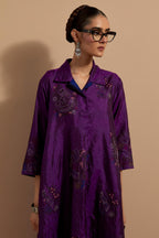 Purple crushed silk A-line short kurta set with hand block print, highlighted with multi colored thread embroidery.