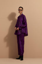Purple crushed silk hand block printed shirt, highlighted with multi colored thread embroidery, paired with Purple crushed silk hand block printed pants, highlighted with multi colored thread embroidery.