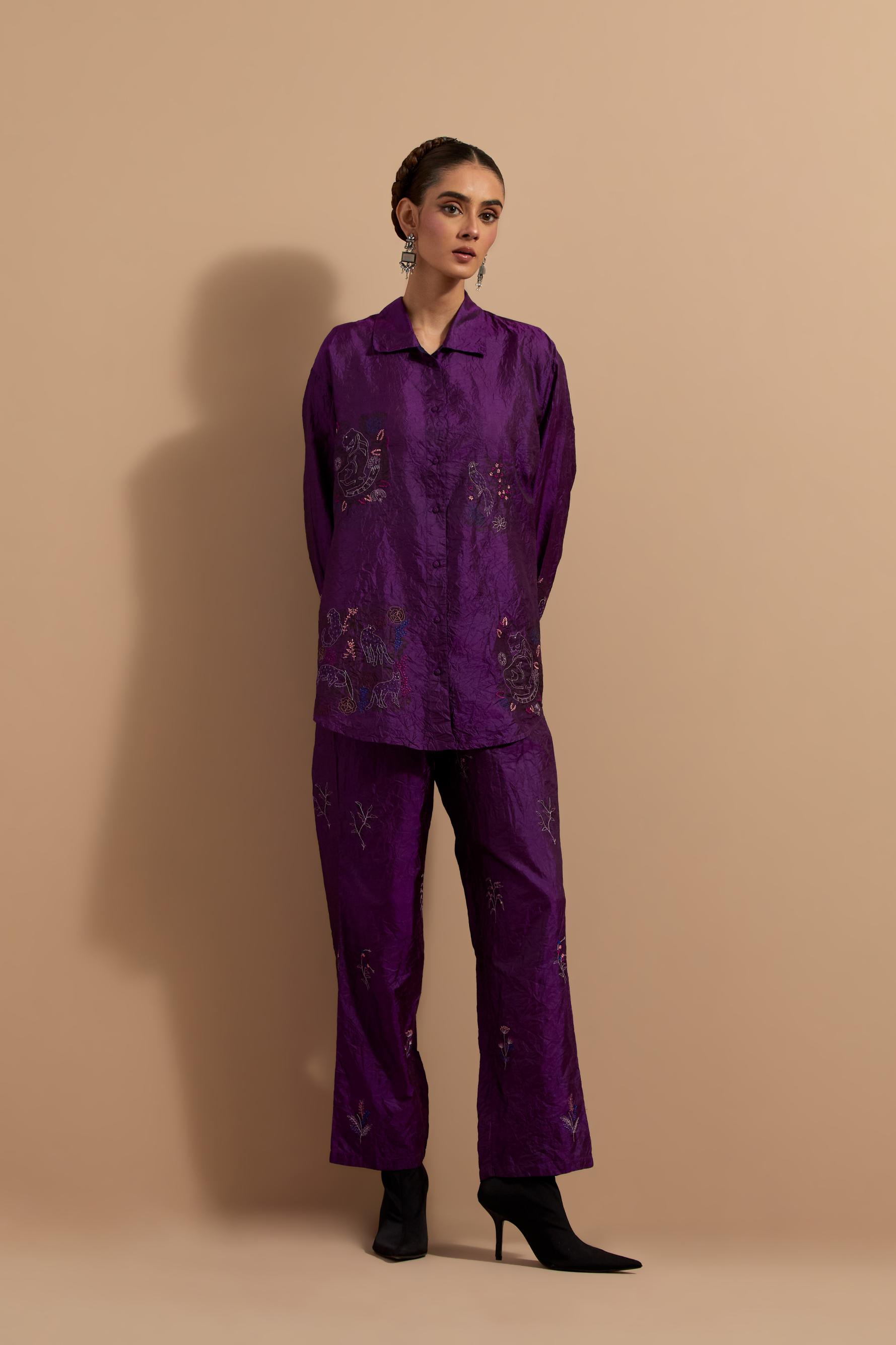 Purple crushed silk hand block printed shirt, highlighted with multi colored thread embroidery, paired with Purple crushed silk hand block printed pants, highlighted with multi colored thread embroidery.