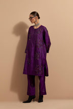 Purple crushed silk short kurta set with hand block print, highlighted with multi colored thread embroidery.