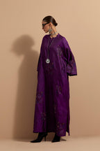 Purple crushed silk hand block printed long kaftan, highlighted with multi colored thread embroidery, paired with Red hand crushed block printed silk stole with quilted embroidery and beaded tassels.