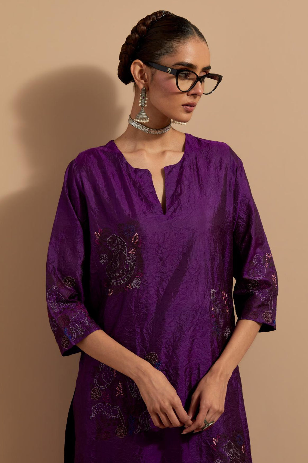 Purple crushed silk hand block printed straight kurta set, highlighted with multi colored thread embroidery.