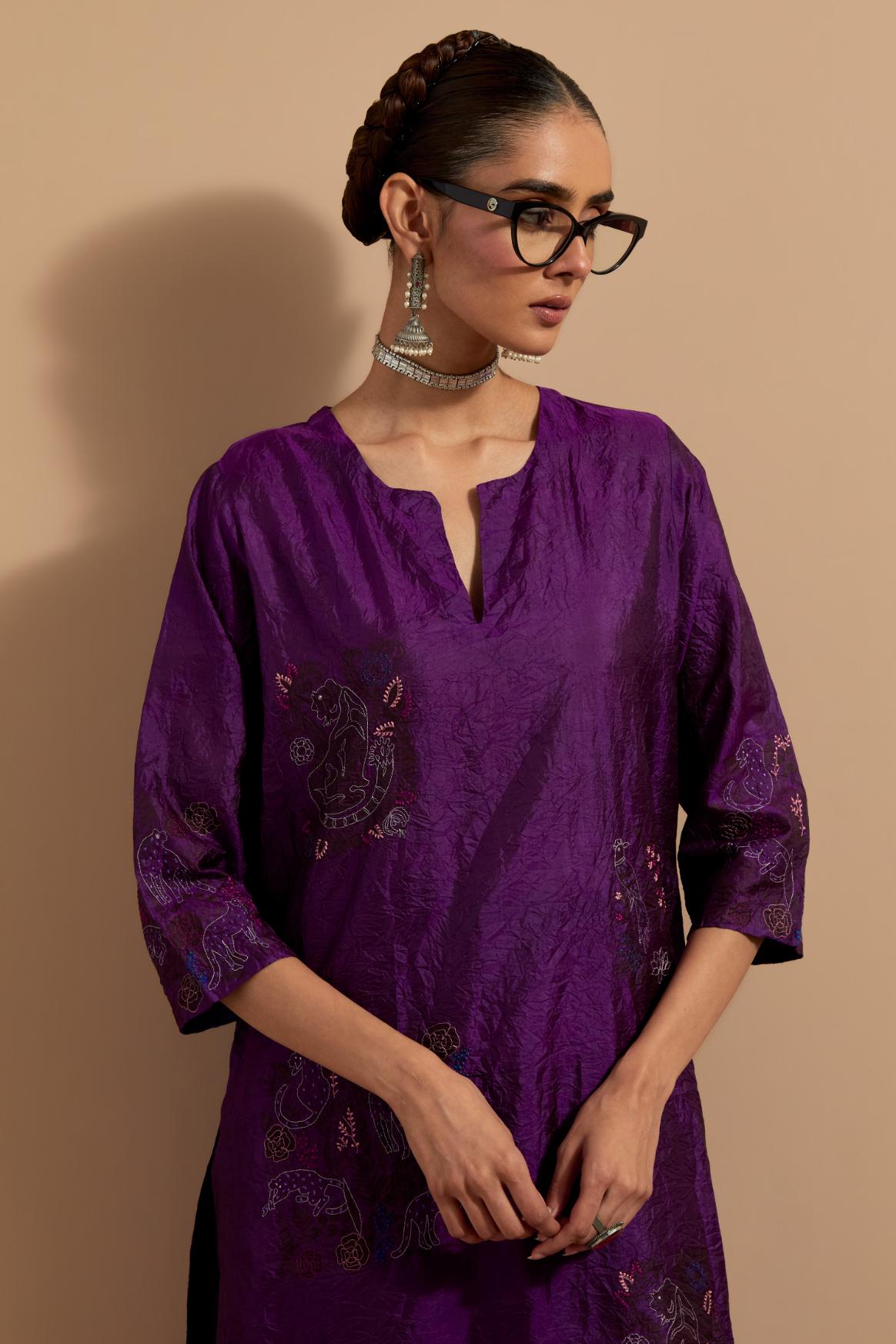 Purple crushed silk hand block printed straight kurta set, highlighted with multi colored thread embroidery.