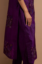 Purple crushed silk hand block printed straight kurta set, highlighted with multi colored thread embroidery.