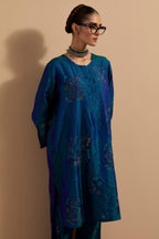 Teal blue crushed silk short kurta set with hand block print, highlighted with multi colored thread embroidery.